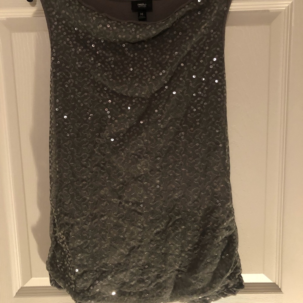 Gray top with iridescent sequins.  Sized Medium.